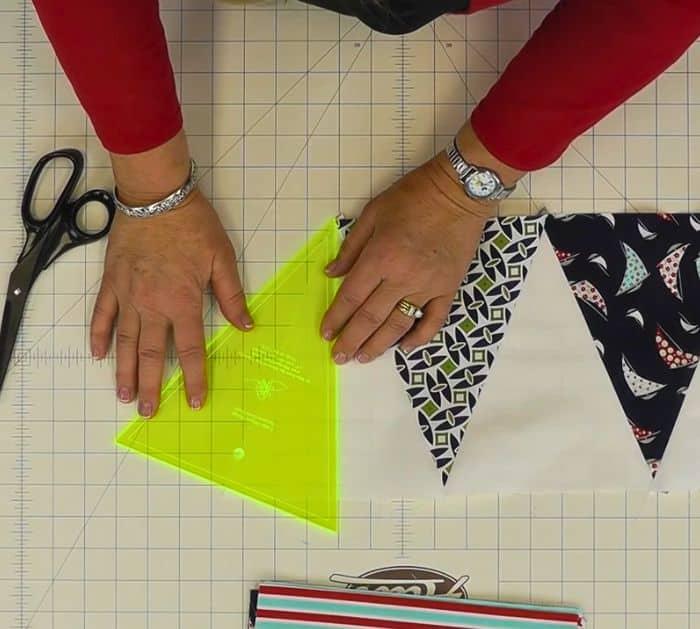 How to Make a Pennant Quilt Using Layer Cakes