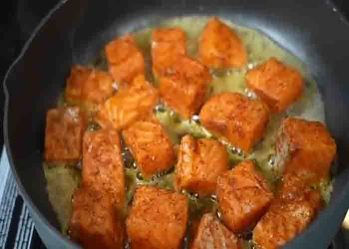 Sauteing the salmon bites