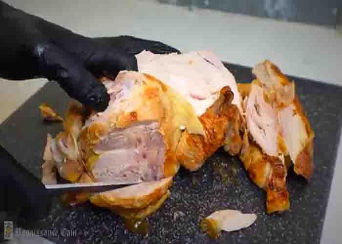 Chopping the rotisserie chicken for the buffalo egg rolls