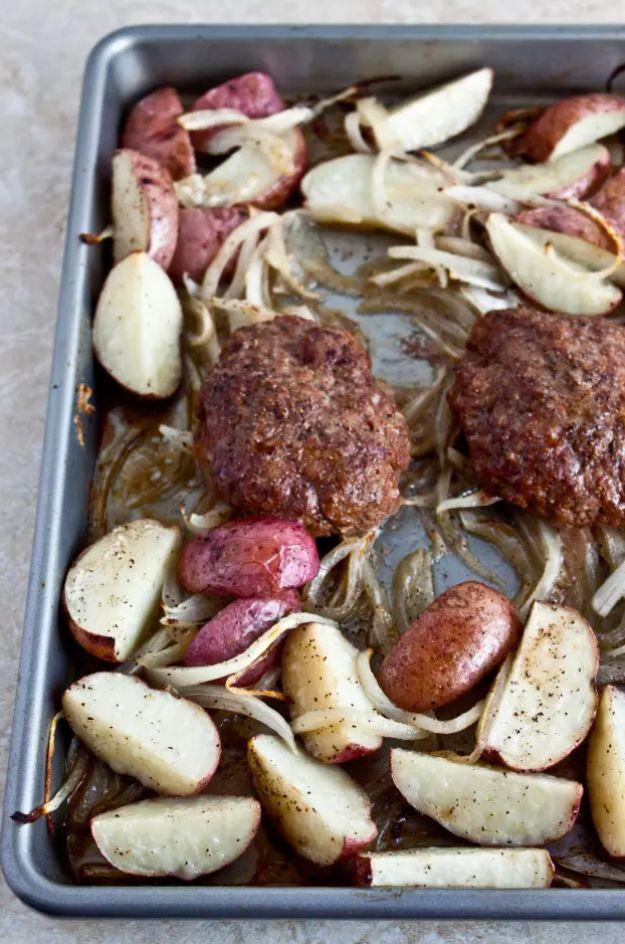 Homemade salisbury steak for two in a rich onion gravy, served with roasted baby red potatoes alongside