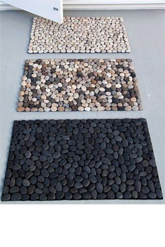 DIY Pebble Bath Mat, one of the prettier picks from this roundup and worth adding to the seasonal decor rotation