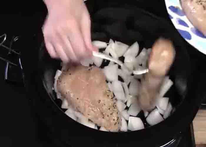 Adding the Cola BBQ chicken in the crockpot
