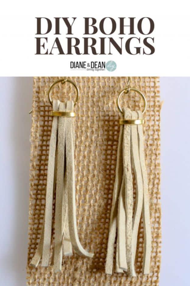 Pair of long cream suede fringe earrings on gold hardware, laid on woven burlap under a typeset title