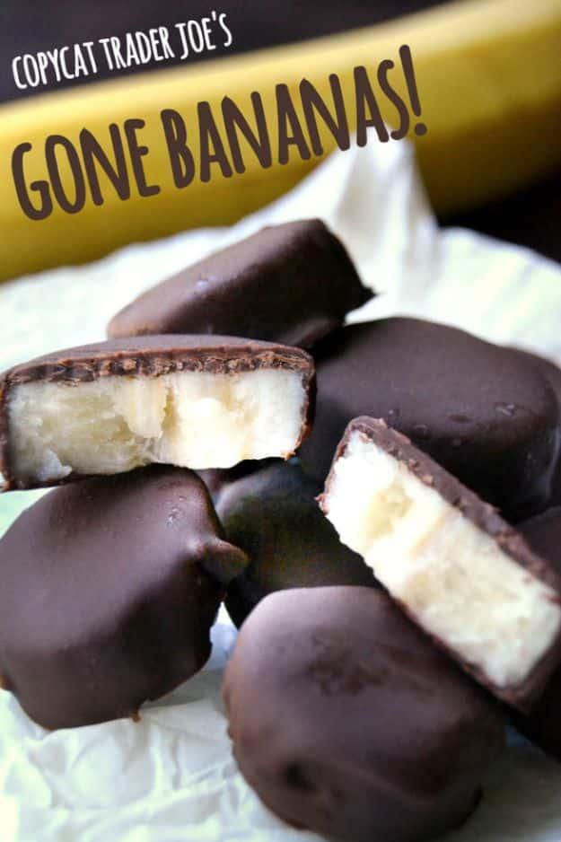 Copycat Trader Joes Gone Bananas, frozen banana slices dipped in dark chocolate on parchment, a copycat frozen banana snack