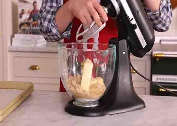 Making the batter for the white chocolate chip cranberry cookies