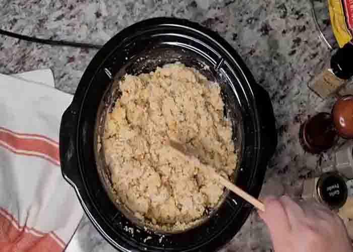 Making the chicken dinner with stuffing in the crockpot