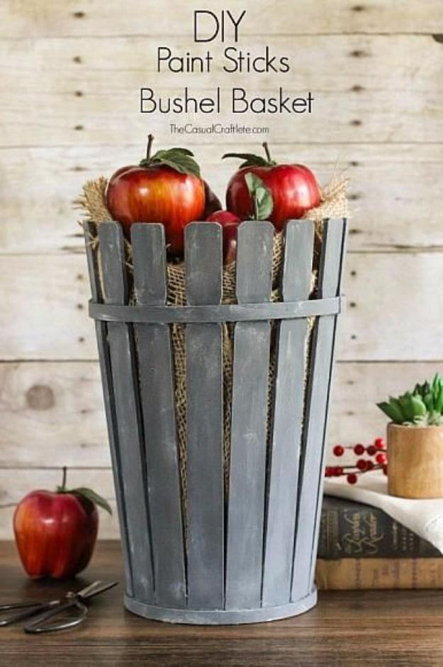 DIY Paint Sticks Bushel Basket, doable in a single sitting with basic tools and a detail guests always ask about
