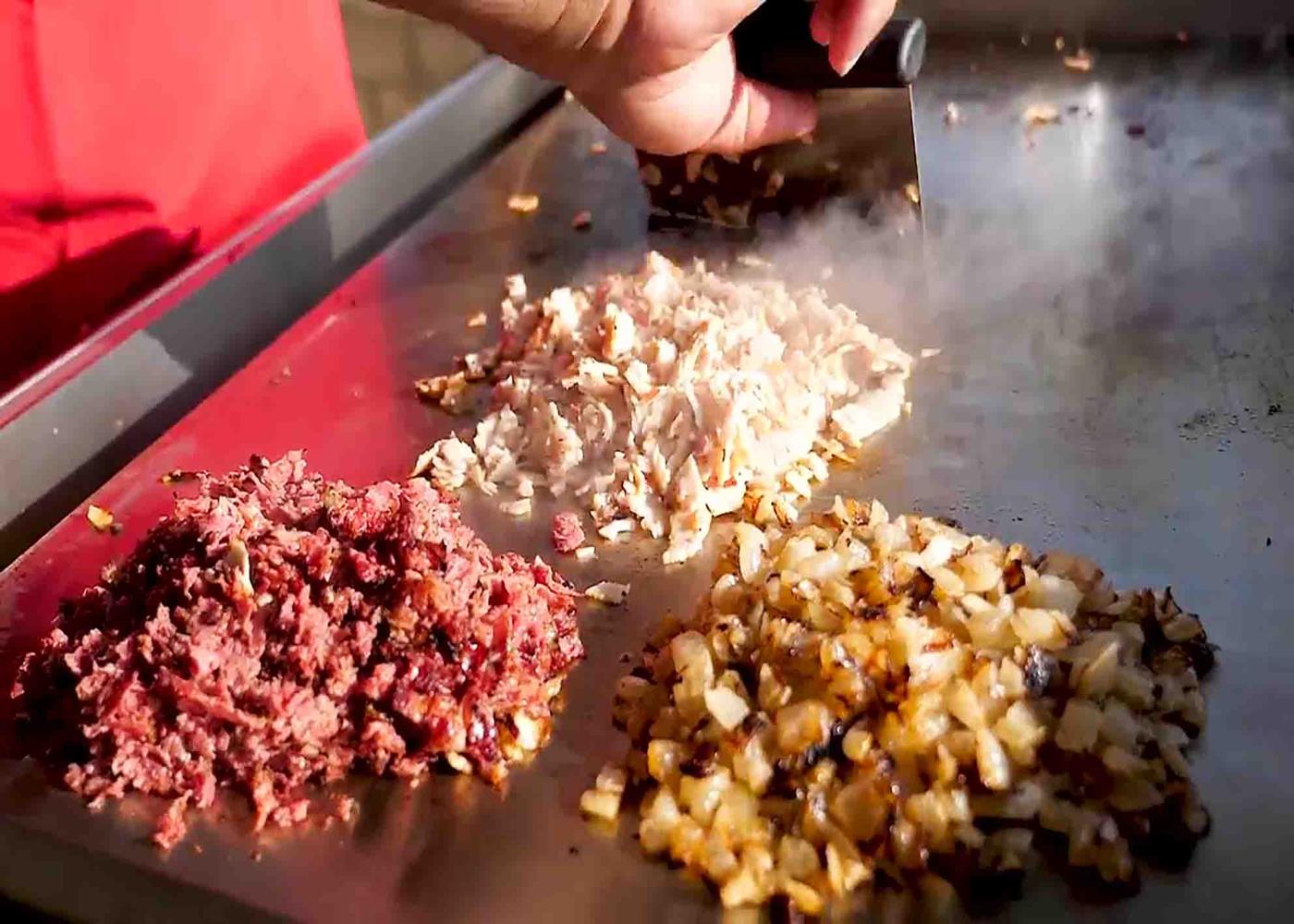 Grilled onions, pastrami, and cajun turkey for the grilled sandwich