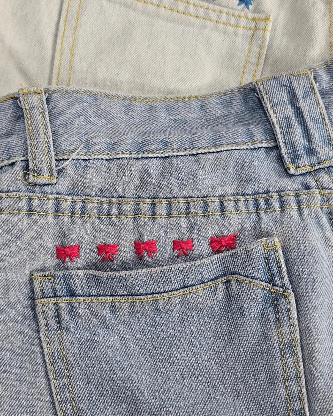 Cute Bow Embroidery On Jeans — stitching the bow tails