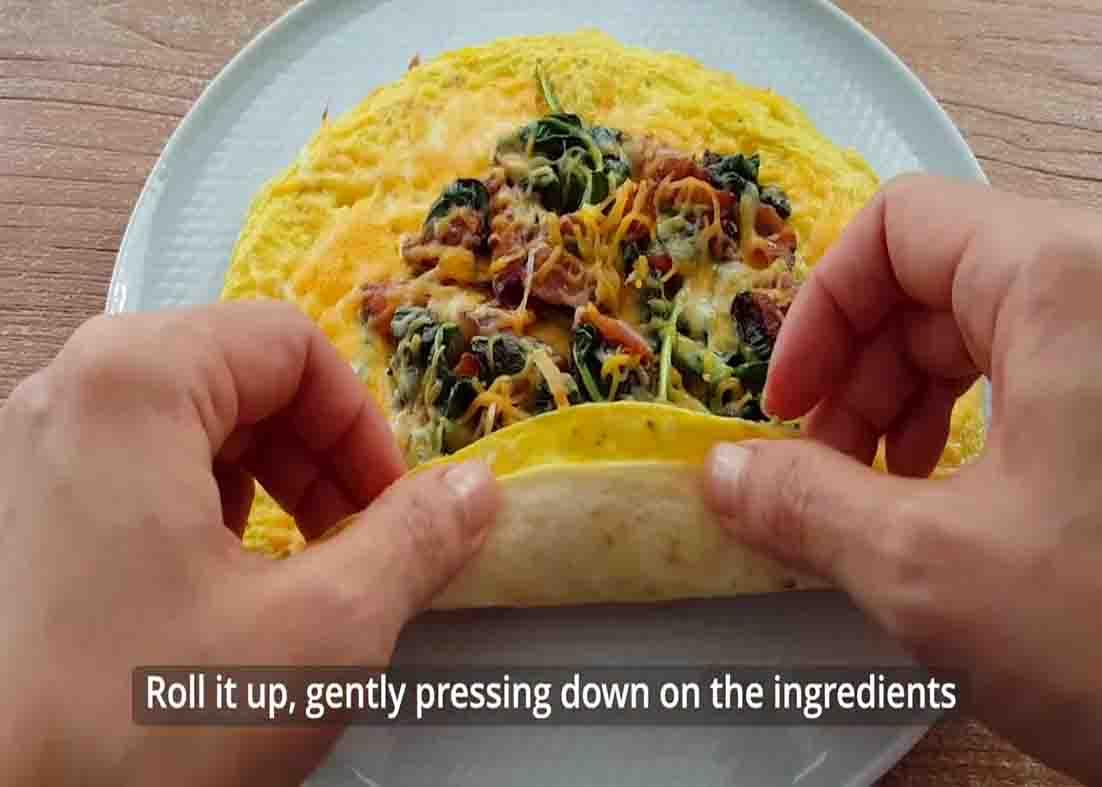Rolling the breakfast wrap