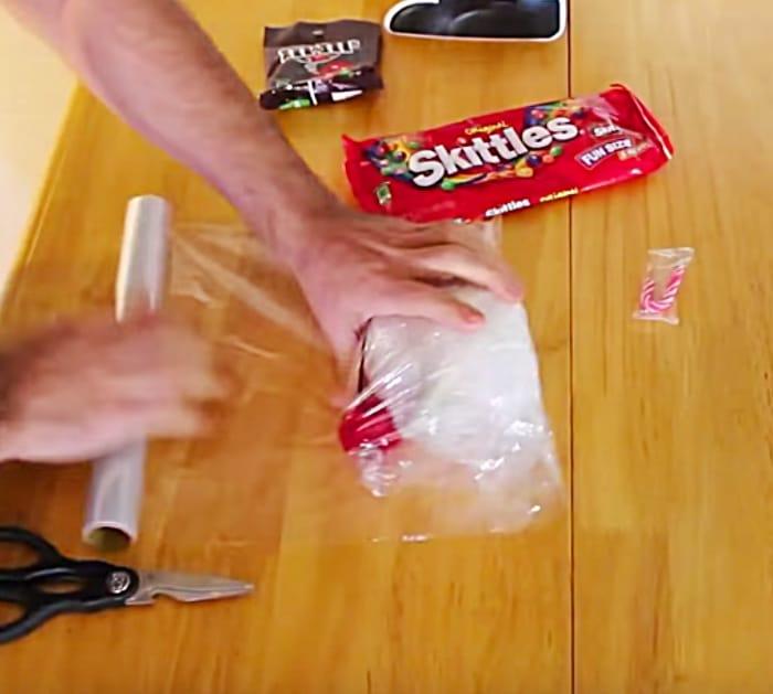 Make a fun easy cheap DIY Saran Wrap Party Game