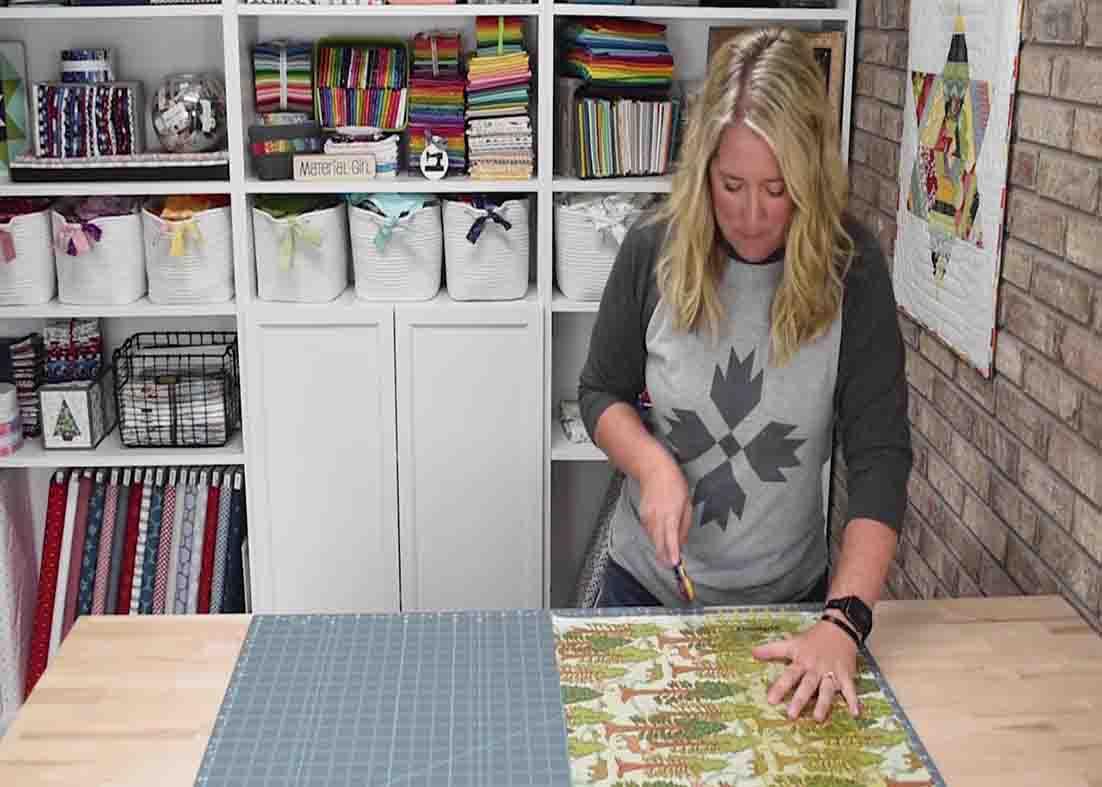 Cutting the fat quarters to make the brick house quilt project