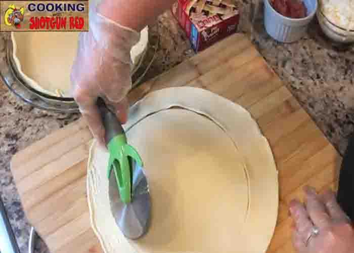 Cutting the pre-made pie crust