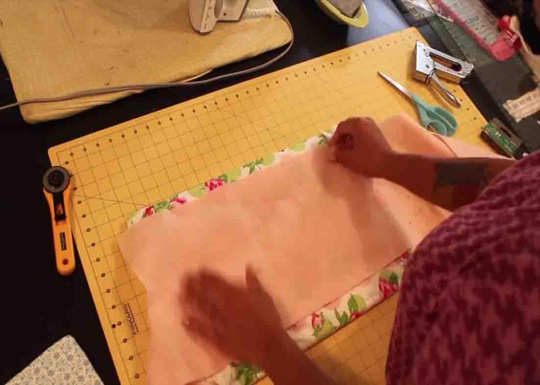 Attaching a felt to the back side to cover it