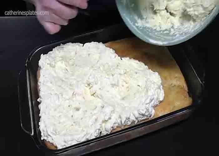 Assembling the peach cake with pineapple surprise