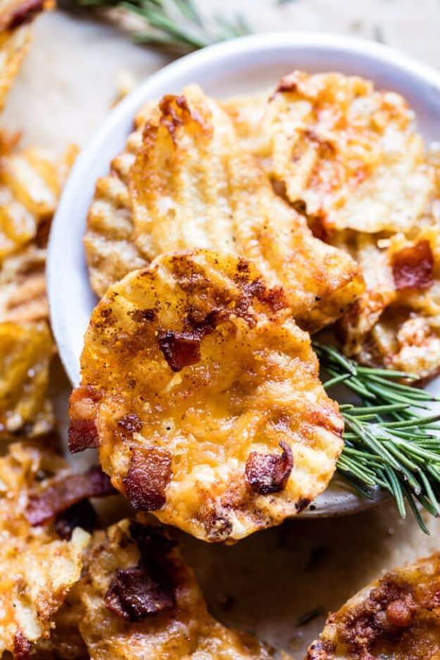 Cheesy bacon holiday crack made from kettle chips baked with cheddar, chopped bacon and brown sugar glaze