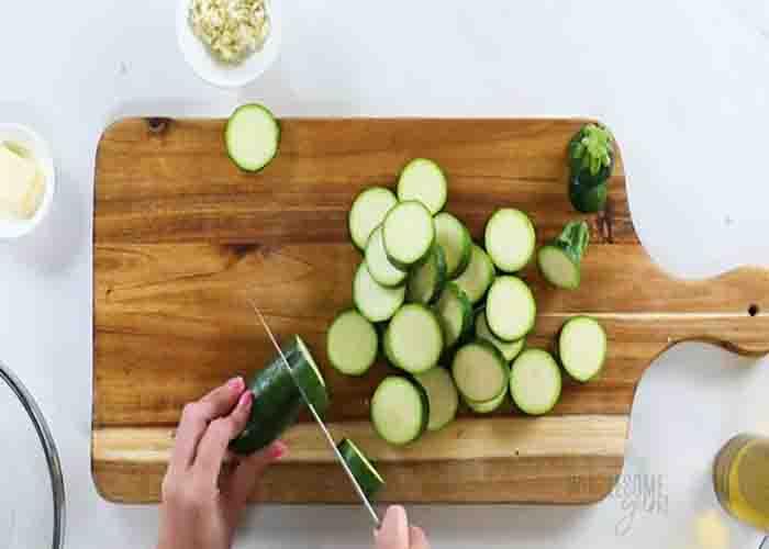 Chopping the zucchini into uniform size