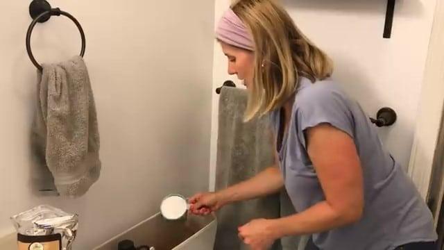 Adding citric acid into the toilet tank
