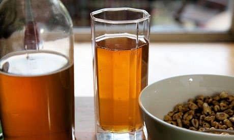 Sugar Puff beer ingredients laid out with malted barley, hops and a solid lump of stuck together cereal