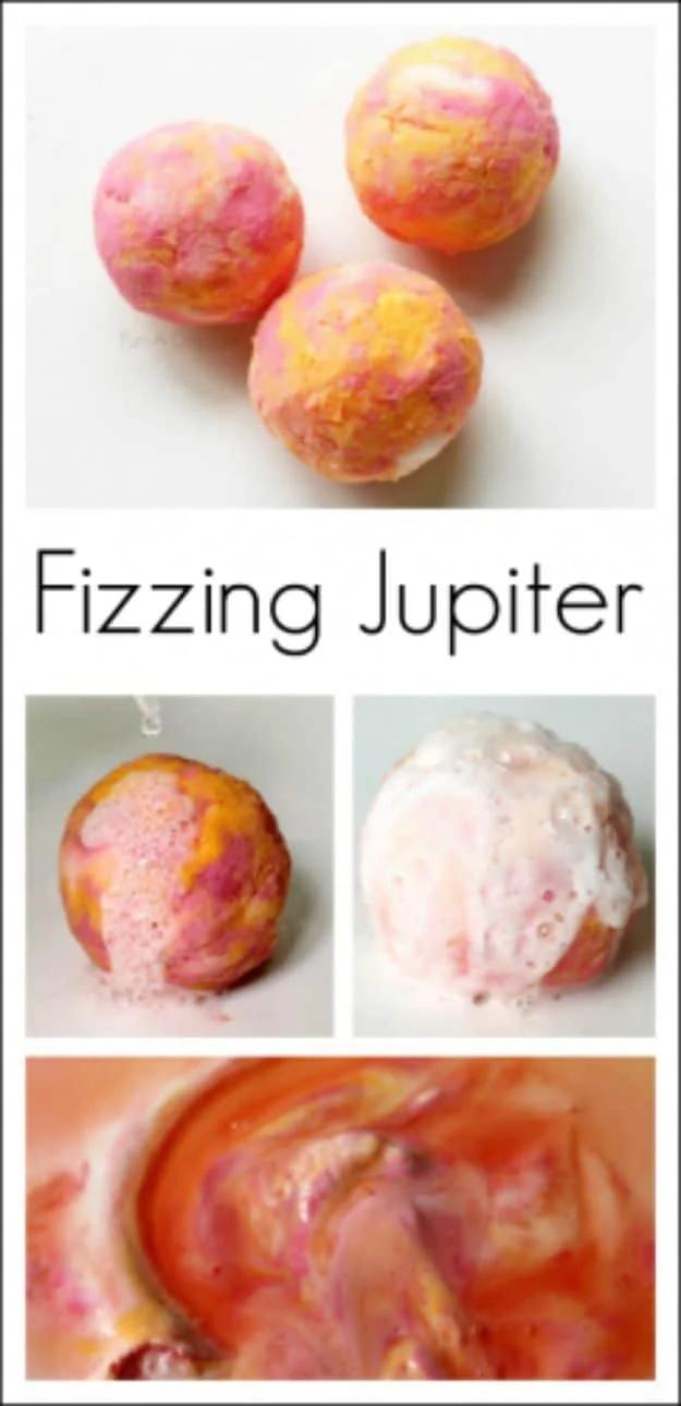 Fizzing Jupiter, three marbled pink orange and white baking soda balls, above panels of one foaming and dissolving in a dish