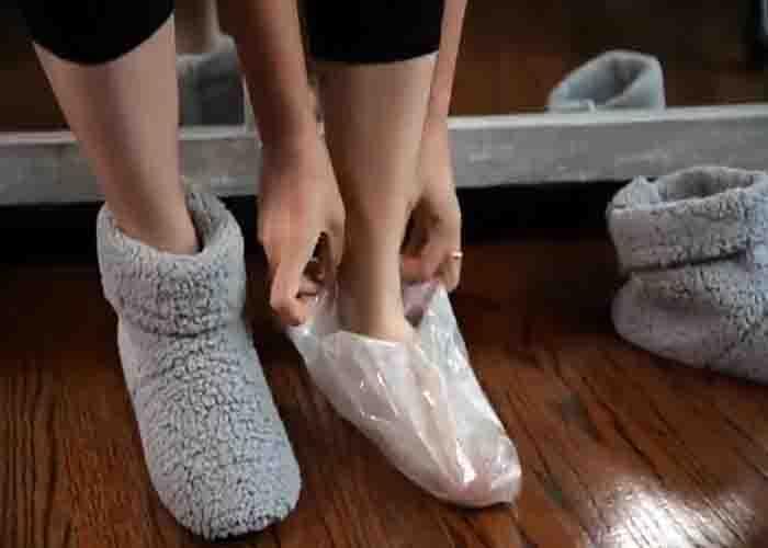 Soaking the feet with the homemade baby foot peel