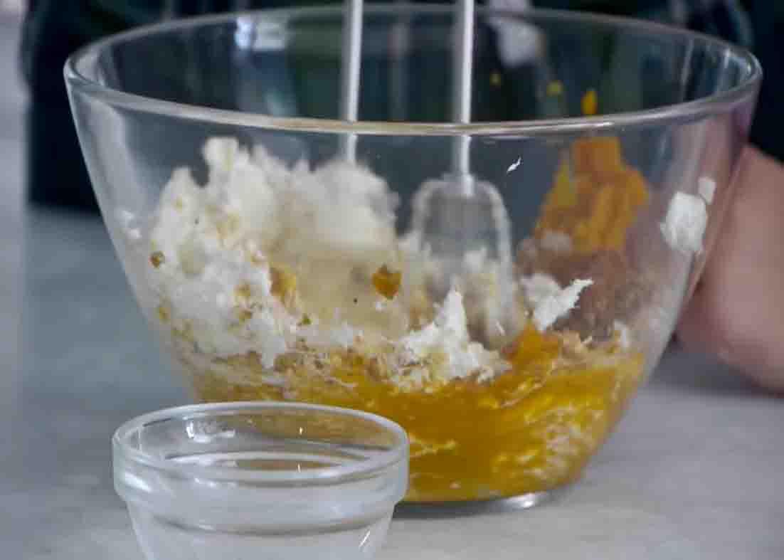Mixing the pumpkin pie parfait ingredients together