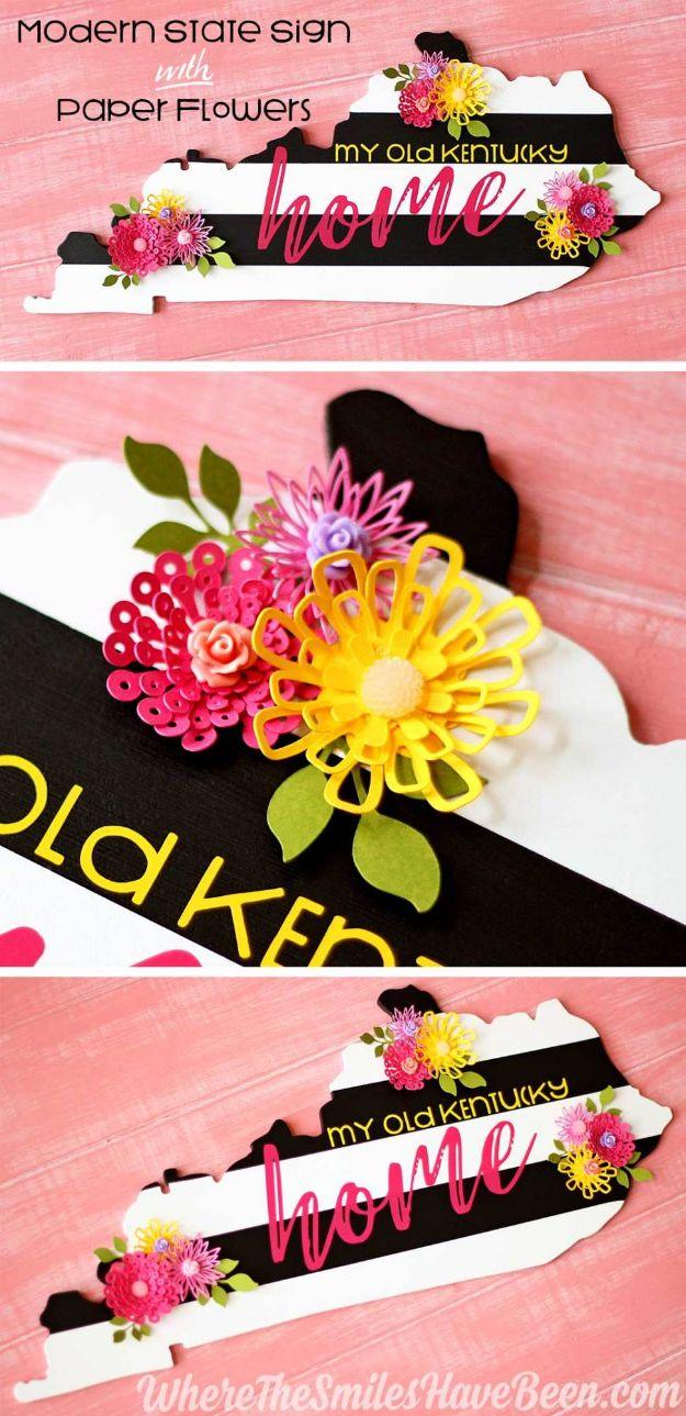 DIY Black & White Striped State Sign with Colorful Paper Flowers, a fun state craft worth making to show some hometown pride