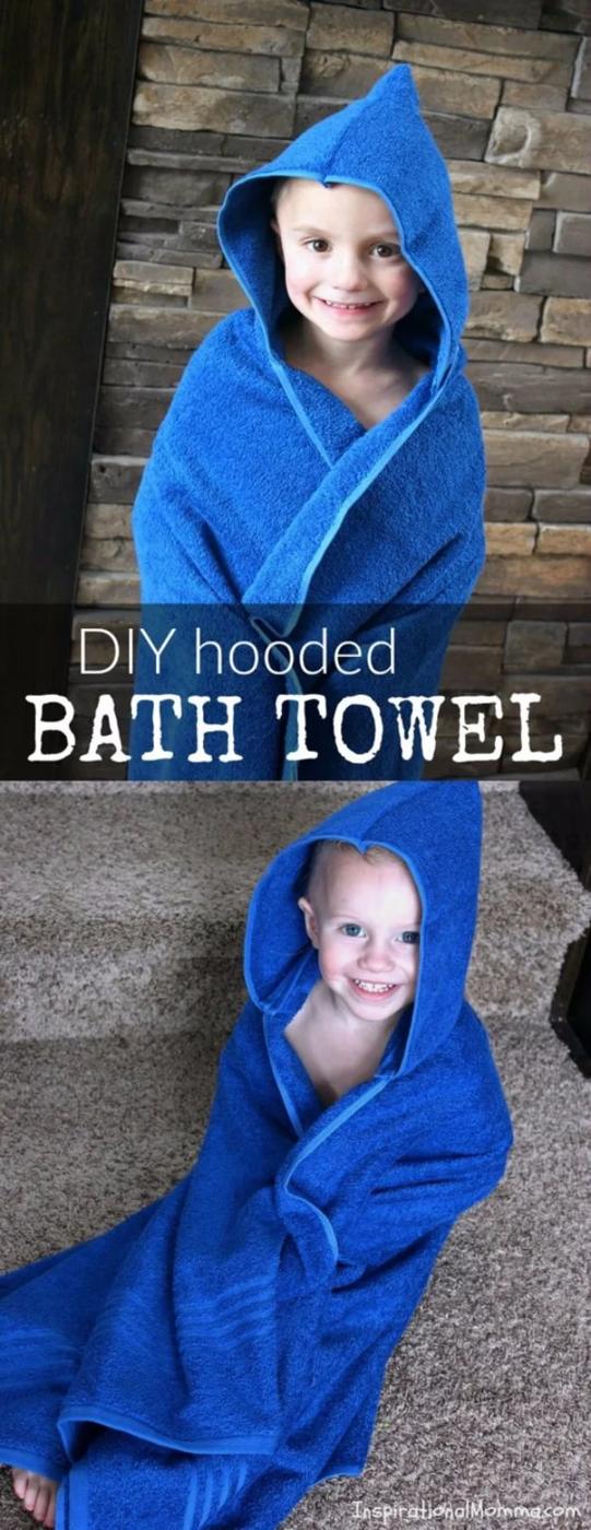 Young child wrapped in a blue hooded bath towel, shown standing and sitting, under a typeset DIY title