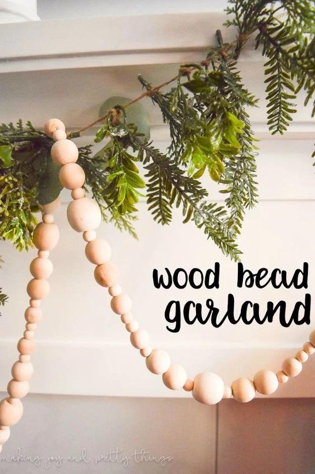 Wood bead garland strung on twine for a simple stylish way to add farmhouse charm to any shelf or mantel