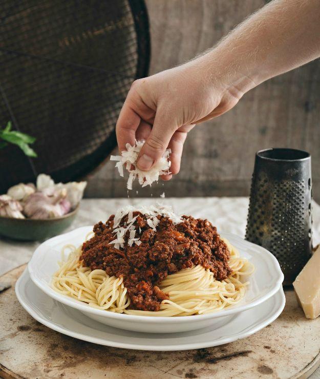 Spaghetti bolognese with a slow simmered ground beef and bacon ragu tossed through long strands of spaghetti