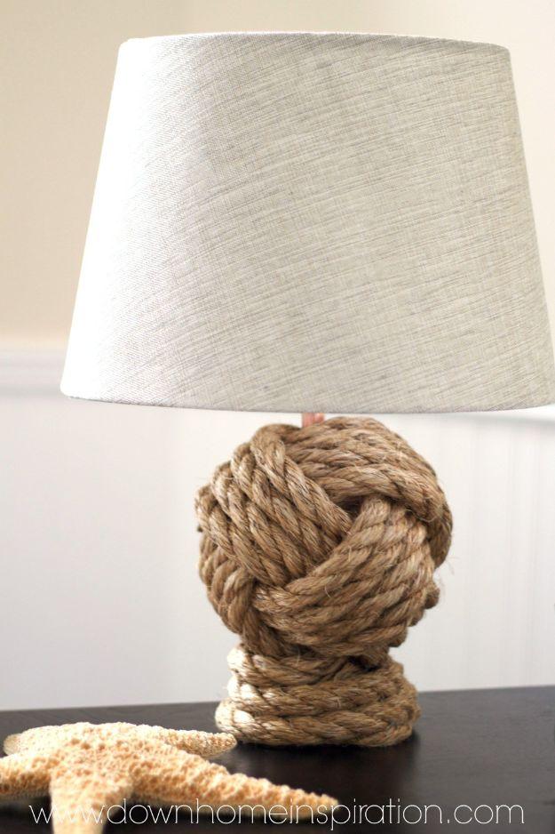 Pottery Barn knockoff rope knot lamp, a thick rope monkey fist knot lamp base under a grey linen drum shade