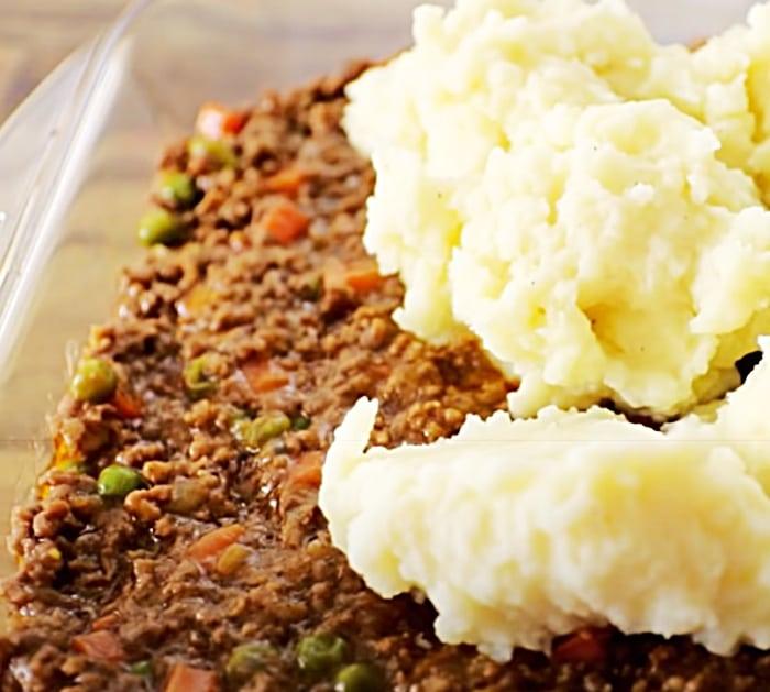 Cover Ground Beef With Mashed Potatoes For Shepherd's Pie