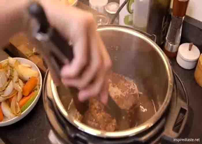 Searing the pot roast first before cooking it in the instant pot