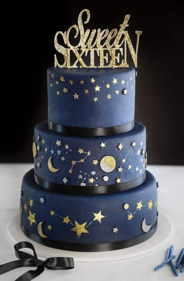 Celestial birthday cake with deep blue galaxy buttercream, gold stars and a crescent moon topper recipe for a celebration