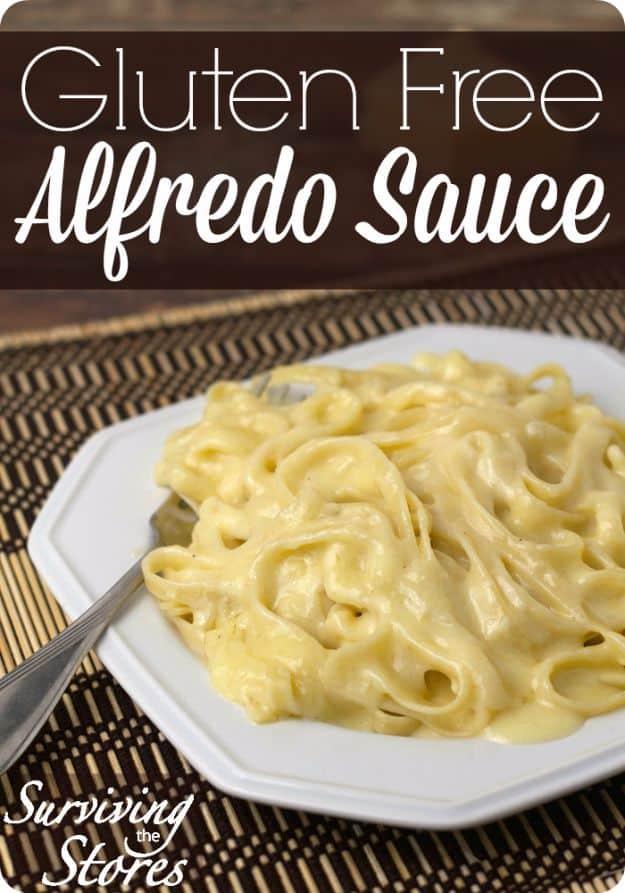 Typeset pin graphic of fettuccine coated in gluten free alfredo sauce on a white plate with a fork on a dark mat