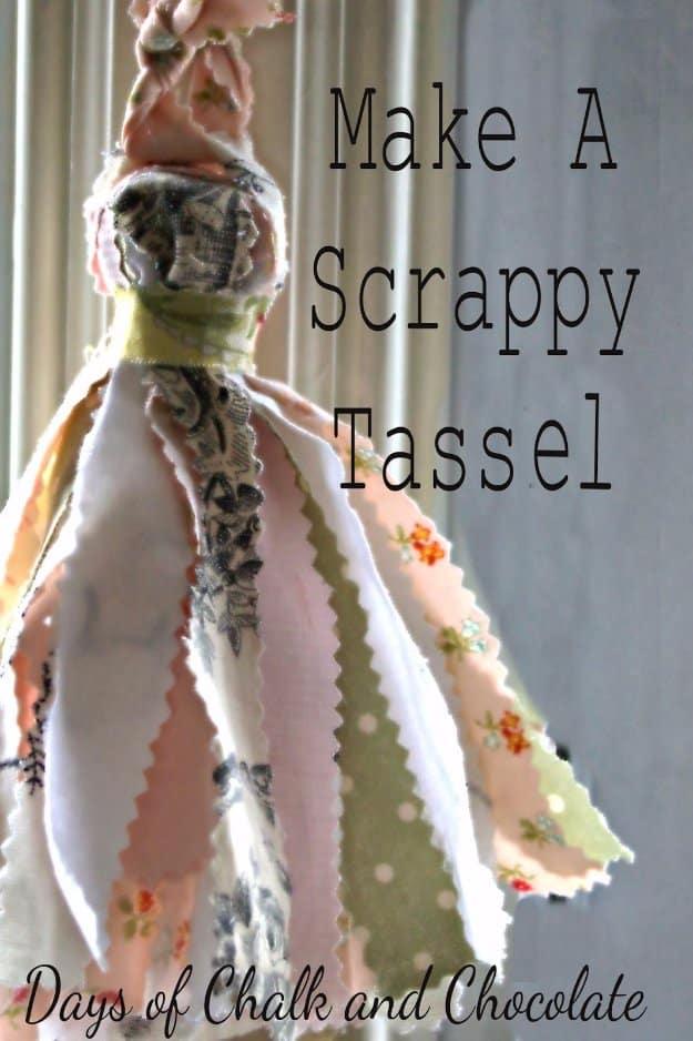 Typeset graphic of a fabric scrap tassel in pale pink, cream and sage prints with pinked edges and a green neck band