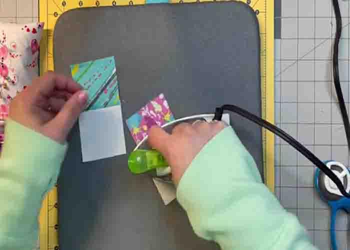 Stitching the squares for the dream weaver quilt block