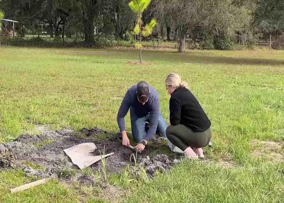 Leveling the ground for the cinder block fire pit