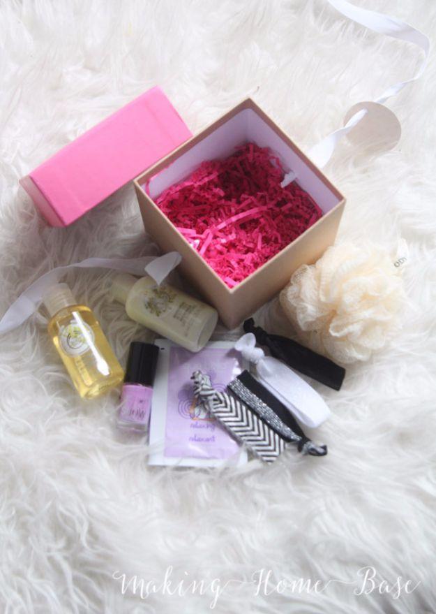 A small gift box packed with bath products, nail polish and a face mask, a spa day in a box gift for her