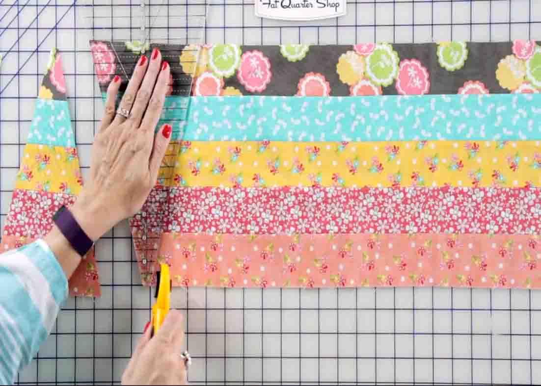 Cutting the firecracker wedges for the firecracker quilt block