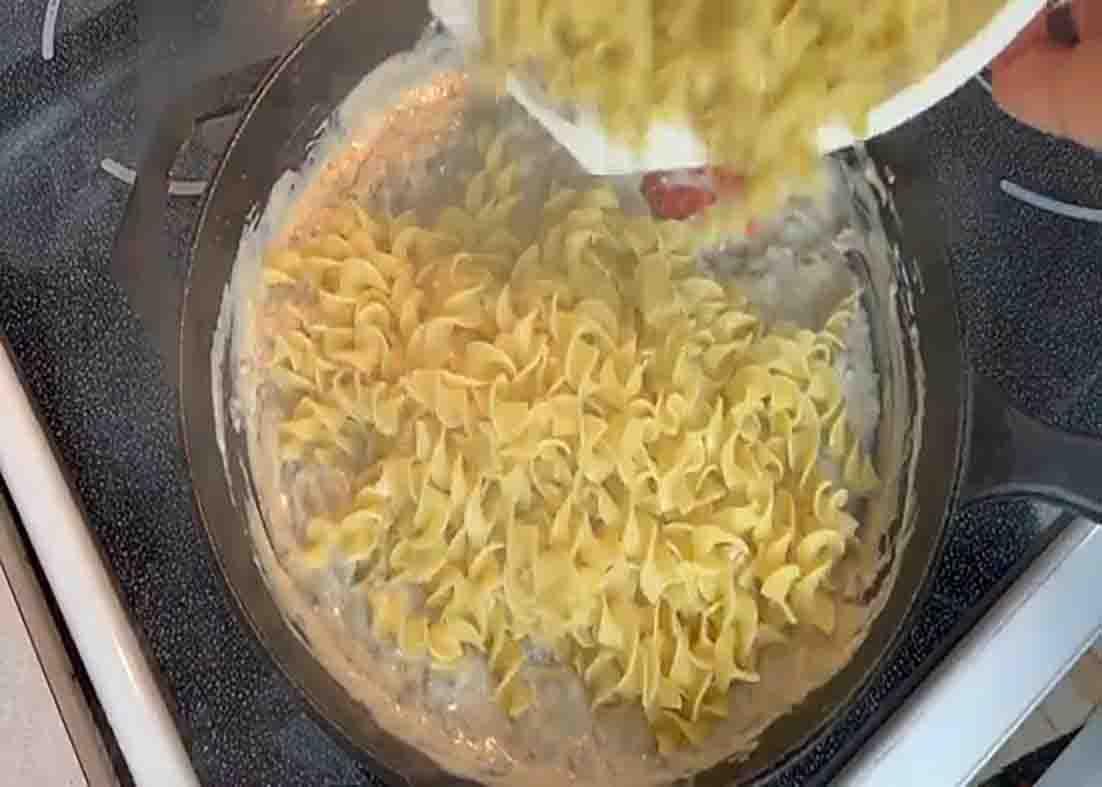 Combining the ingredients for the ground beef stroganoff recipe