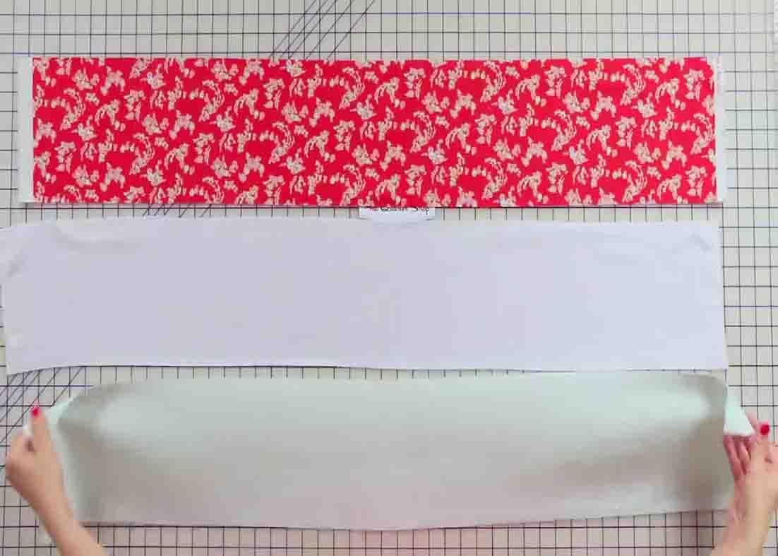 Stacking the fabric strips to make the flannel rag quilt