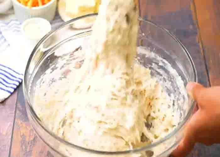 Making the dough for the bacon cheddar swim biscuits