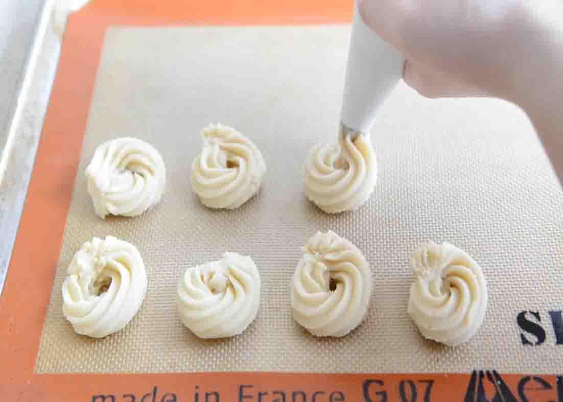 Piping out the shortbread cookie dough