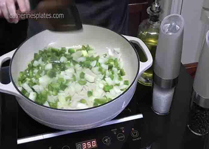 Sauteing the onion and bell pepper for the sausage and pasta skillet recipe