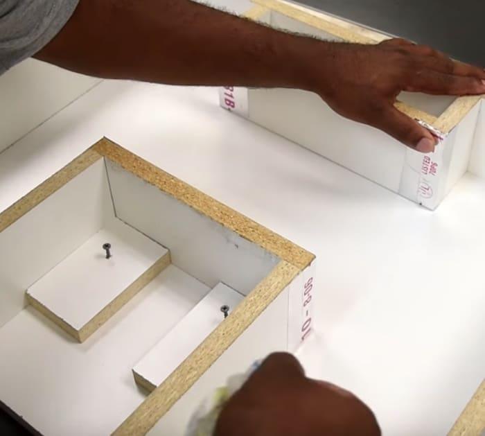 Make a modern style concrete and wood bench