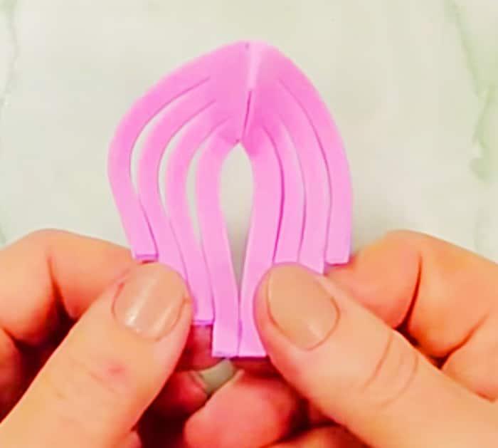 Learn to make a glitter foam DIY heart ornament with foam from Michaels Craft Store