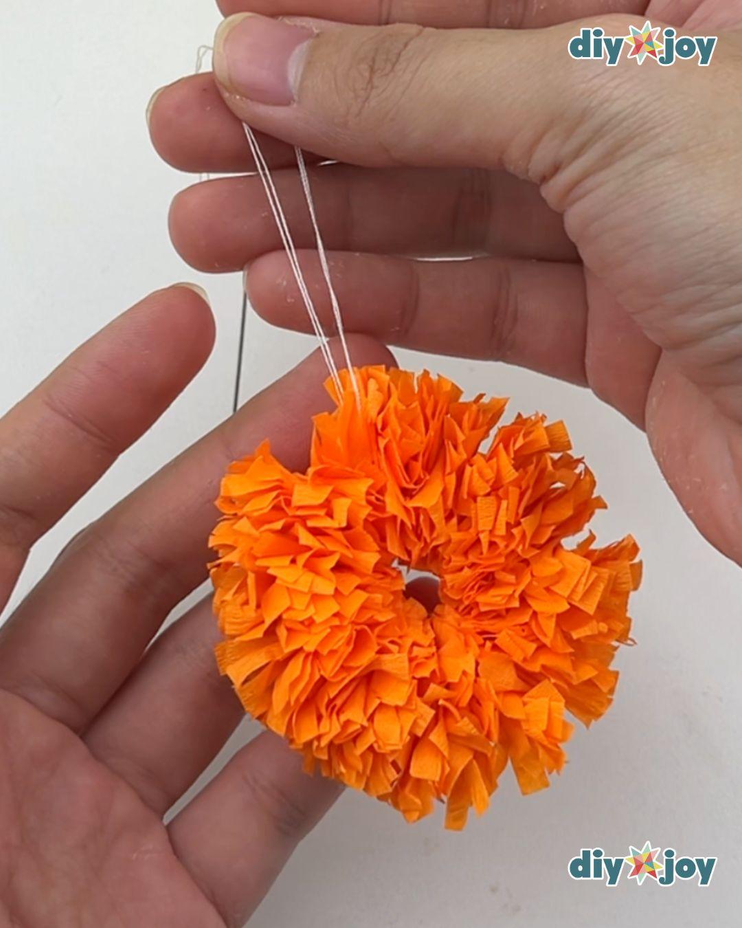 Marigold Garland Using Crepe Paper Streamers - crepe paper flowers