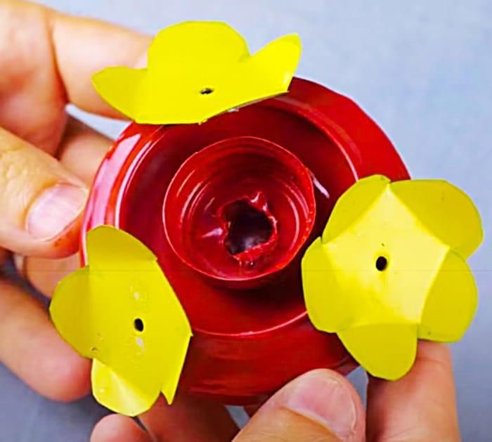 Spray Paint A Can To Make A Hummingbird Feeder