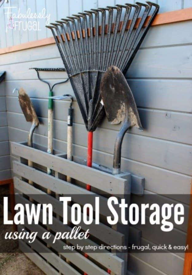 Lawn Tool Storage graphic showing a gray pallet on siding holding a leaf rake, a shovel and hand trowels